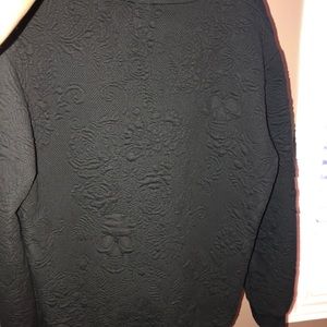 Black with raised patterns sweater